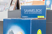 Sammelbox und Verbraucherflyer im Handel